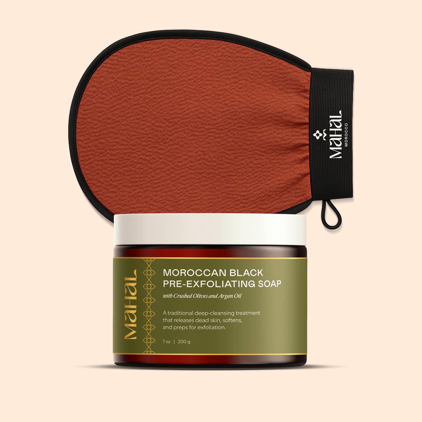 Moroccan Black pre-exfoliating soap with a brown exfoliaitng glove on a beige background